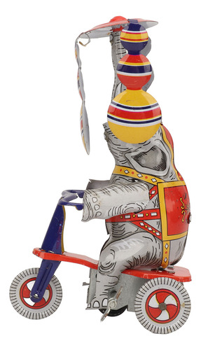 Juguete Retro De Hojalata Con Forma De Elefante Sobre Tricic