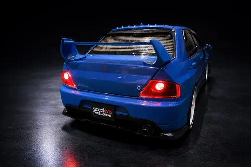 Miniatura Mitsubishi Lancer Evo Ix Azul Tuning 1:24 Luz/som