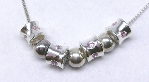 Imagen 1 de 2 de Collar Con Dijes Con Cristales Rosas En Plata Ley .925