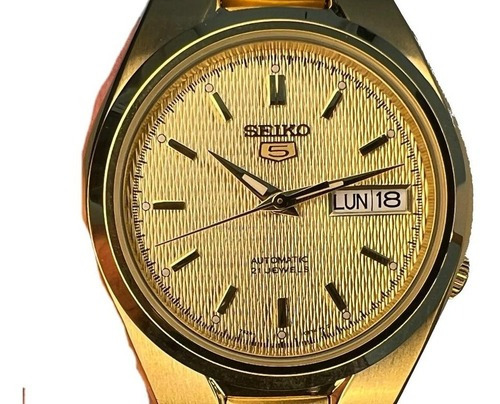 Reloj Seiko Masc automático transparente con 21 rubíes y correa dorada, color SNK610K1-GOLD