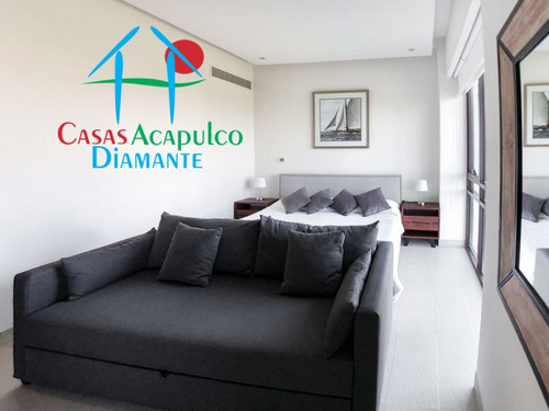 Cad La Isla Gran Caimán 604. Terraza Con Vista A Los Jardines Y Albercas