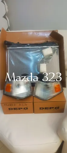 Radiador Mazda 323