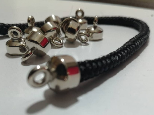 Imagen 1 de 3 de Terminal Para Cordón Plástico Con Orejas 12mm.