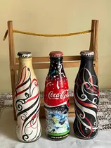 Comprar Trío De Botellas Coleccionables Coca Cola 237cc.con Repisa
