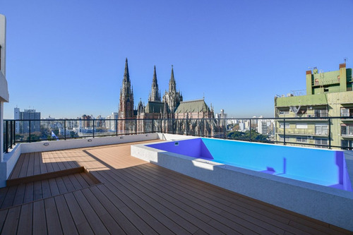 Semipiso De Dos Dormitorios, Balcon Y Cochera.