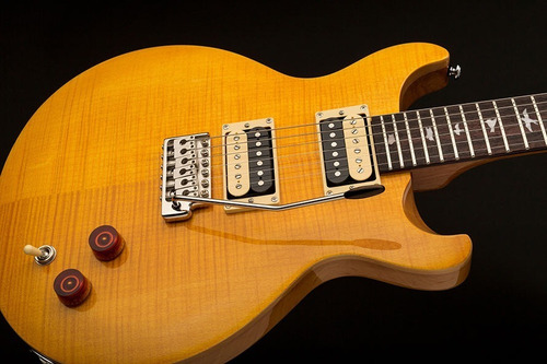 Guitarra Prs Se Santana Sy Sa amarilla con bolsa de color amarillo