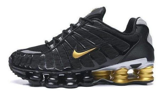 nike shox dourado masculino