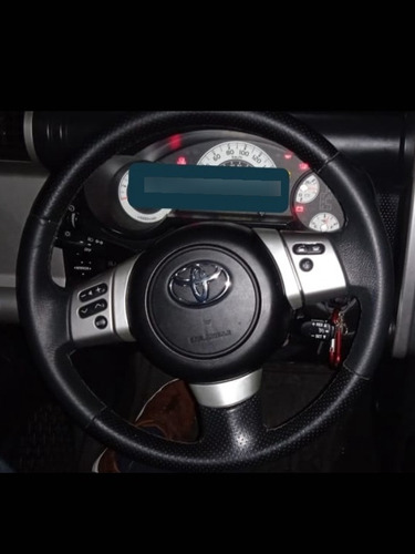 Toyota Fj Mandos En El Volante 