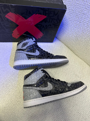 Tenis Jordan 1 Retro High Rebellionaire (28.5mx) (Usado)