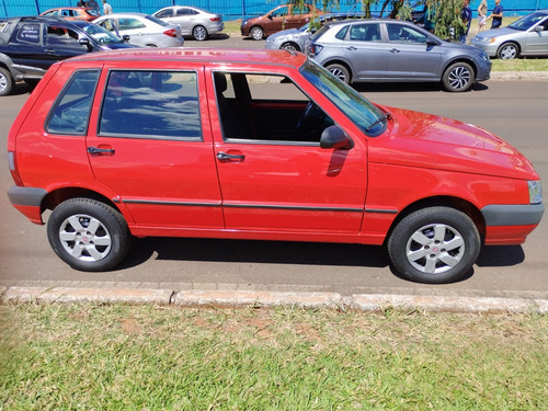 Fiat Uno 1.4 Economy Celeb. Flex 4P