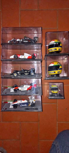 Coleccion De Autos De Formula 1 Y Cascos De Ayrton Senna