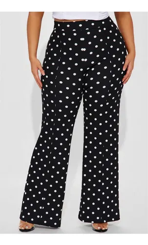 Pantalon negro con bolitas blancas sales