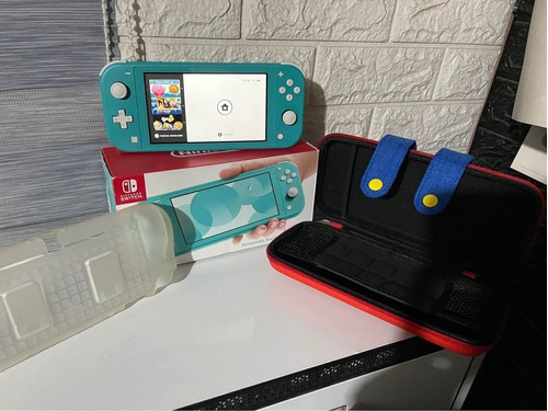 Nintendo Switch Lite + Extras 