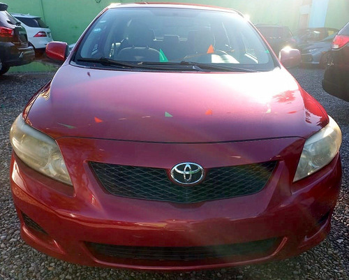 Imagen 6 de 9 de Toyota Corolla 2009 Rojo Metalico Impecable
