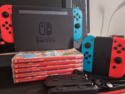 Nintendo Switch + 2 Joy-con + 5 Juegos + Escuche 