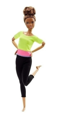 Imagem 1 de 7 de Barbie Articulada To Move Top Amarelo Morena Ms Sj