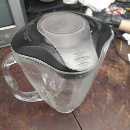 Imagem 1 de 10 de Copo De Vidro Pra Liquidificador Oster Usado Com Tampa Ler