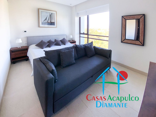 Cad La Isla Gran Caimán 604. Terraza Con Vista A Los Jardines Y Albercas