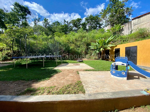 Julio Latouche 24-20805 Hermosa Casa En Alquiler Colinas De Guataparo Valencia, Amplias Áreas Verdes, Tanque De Agua 10.000 Lts.
