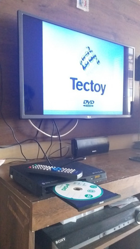 Imagem 2 de 8 de Aparelho Dvd Tectoy Com Controle Remoto Funcionando B