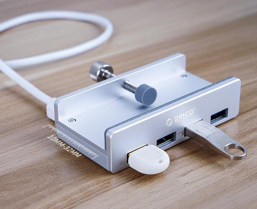 # Orico Mh4pu Usb3.0 4 Puertos Monitor Mesa Clip Tipo Hub