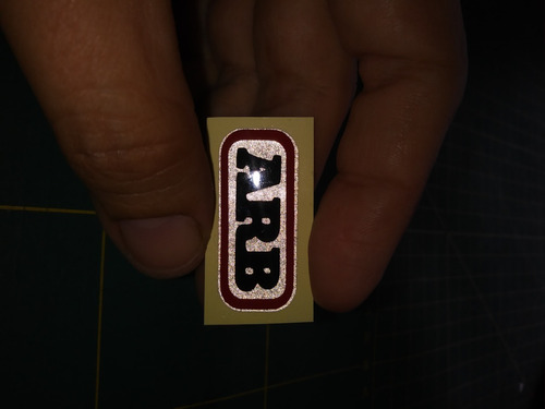 Imagen 3 de 5 de Emblema Arb Para Faro Reflectivo Con Pega Extrafuerte