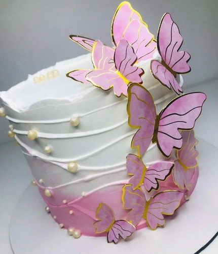 Fiesta de cumpleaños con diseño de tarta de mariposas y rosas doradas
