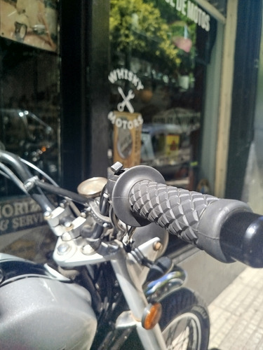 Suzuki Ax 100