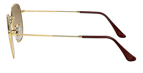 Imagen 3 de 3 de Anteojos de sol Ray-Ban I-Shape Hexagonal Large con marco de metal color polished gold, lente light brown de cristal degradada, varilla polished gold de metal - RB3548