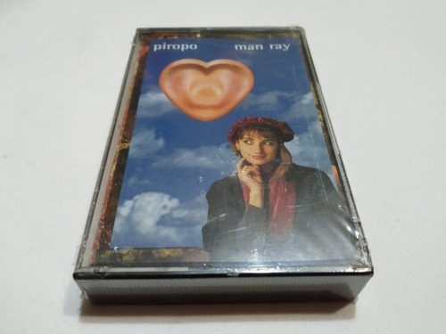 Man Ray · Piropo · Cassette Nuevo / Hilda Lizarazu