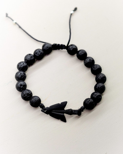 Imagen 1 de 1 de Pulsera Bolita Vulcanita Con Punta Negra - Caballero