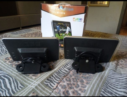 Imagem 2 de 4 de Dvd Automotivo Acosto De Cabeça Para Veículos Em Geral