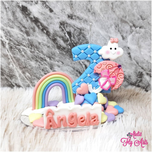 Imagem 1 de 4 de Vela Topo De Bolo Em Biscuit Chuva De Amor Arco Iris