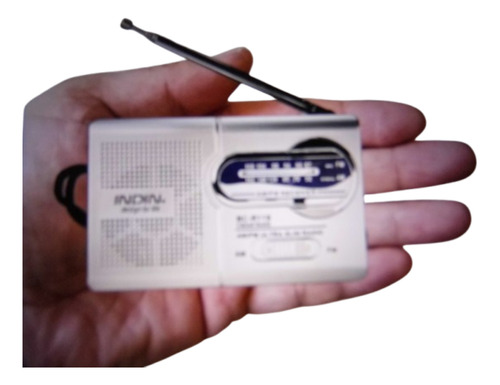 Mini Radio Compacto Am/fm Con Bocina Y Antena Integradas.