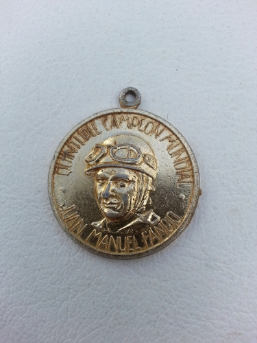 Medalla Juan M. Fangio Quintuple Campeon Trajes Suixtil 