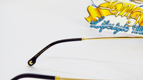 Lentes Sol Carrera 1023s Iconic Bridge Pilot Unisex 60mm Color Black/Gold/Brown 2M2/86 Color de la lente Café Color de la varilla Dorado/Negro Color del armazón Negro brillante/Dorado Diseño Luxury