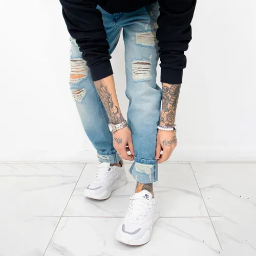 Jean con roturas hombre hotsell