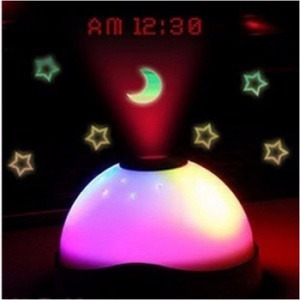 Imagen 2 de 4 de Reloj Despertador Con Proyector De Estrellas Y Hora Enviogra