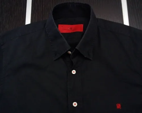 Camisa negra carolina herrera hotsell