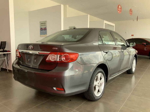 Imagen 3 de 14 de Toyota Corolla 2011 4p Xle Aut W/moonroof A/a Ee Cd R-16 Ab