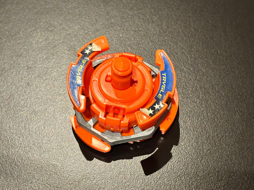 Trygle Beyblade Bakuten Takara Tomy Naranja