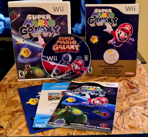 Super Mario Galaxy Y Moneda Conmemorativa De Coleccion