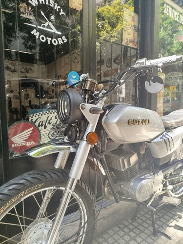 Suzuki Ax 100