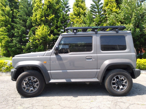 Imagen 3 de 6 de Canastilla Suzuki Jimny Elegante Y Robusta Con Luces Led