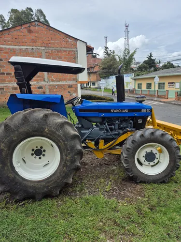 Tractor 6610 New H. -carraro, Pala Frontal, Arado Y Rotavito