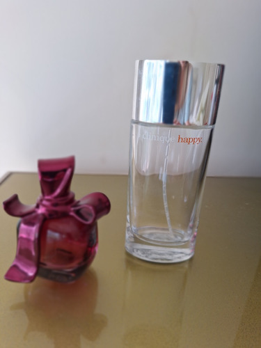 Dos Frascos Vacíos De Perfumes Ricci Y Clinique