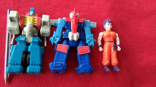 Dois Bonecos Tipo Robôs Transformers + Personagem Japonês