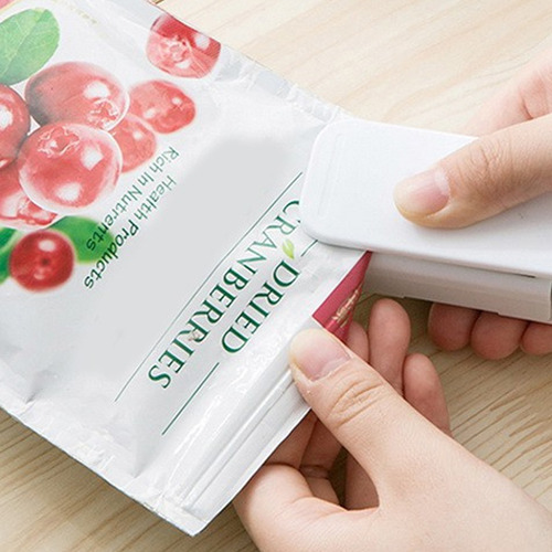 Imagen 3 de 7 de Sellador De Bolsa De Plastico Mini A Pila Portatil Con Iman