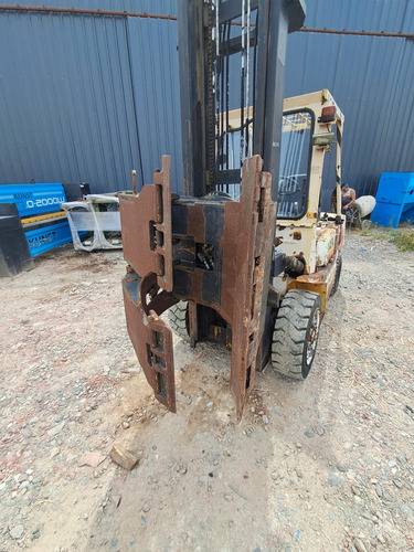 Autoelevador Tcm Cap.3000kg Con Clamps Para Bobinas
