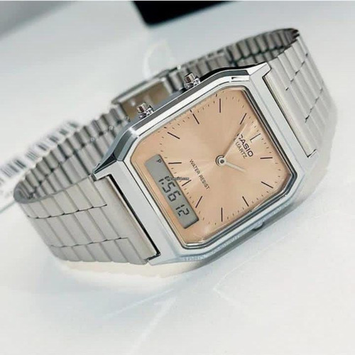 Reloj Casio Vintage Unisex Aq230 Alarma Cronómetro Correa Plateado Bisel Plateado Fondo Naranja Claro